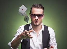 Poker Player with Sunglasses and Cards