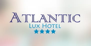 Logotipo de Atlantic Lux Hotel y Casino en Colombia