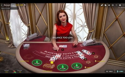 The Dealer Is in the Middle of a Dealing with One of the Participants on Blackjack Silver 4