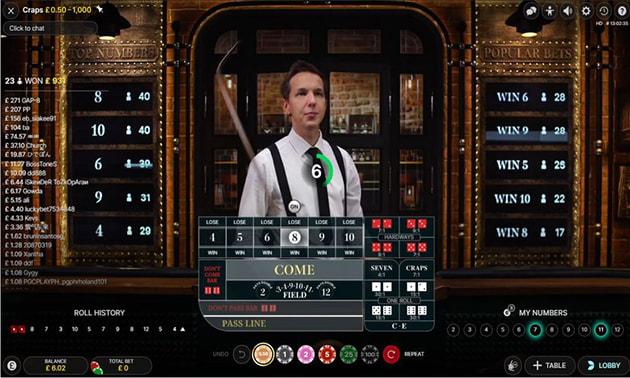 Live dealer hosting online casino craps game with betting board and results display