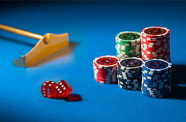 Casino Chips and Dice on a Table