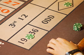 High Outside Bet with a Green Chip at Roulette 