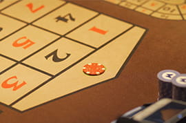 Red Chip Bet at a Zero on a Roulette Table