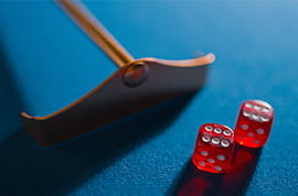 Two Red Dice on a Casino Table