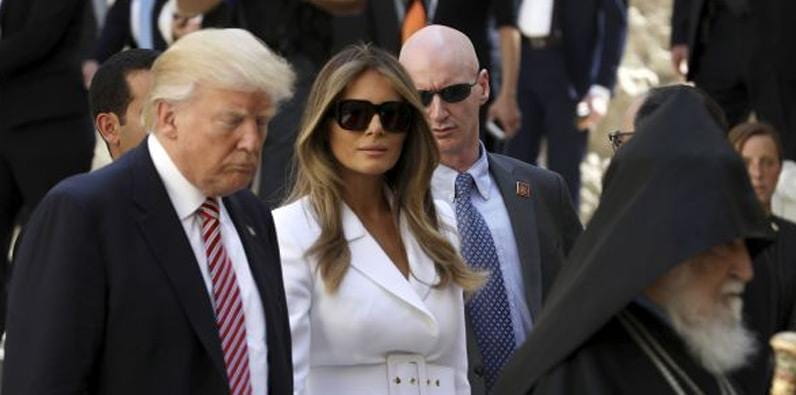 First Lady Melania Trump Flicks Her Husband’s Hand 