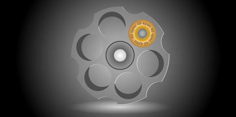 The Cylinder of a Revolver With a Single Loaded Cartridge