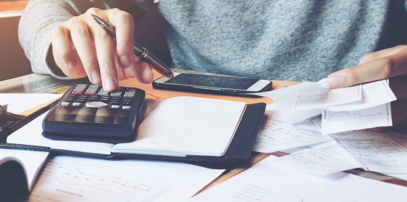 Calculator Atop a Piece of Paper