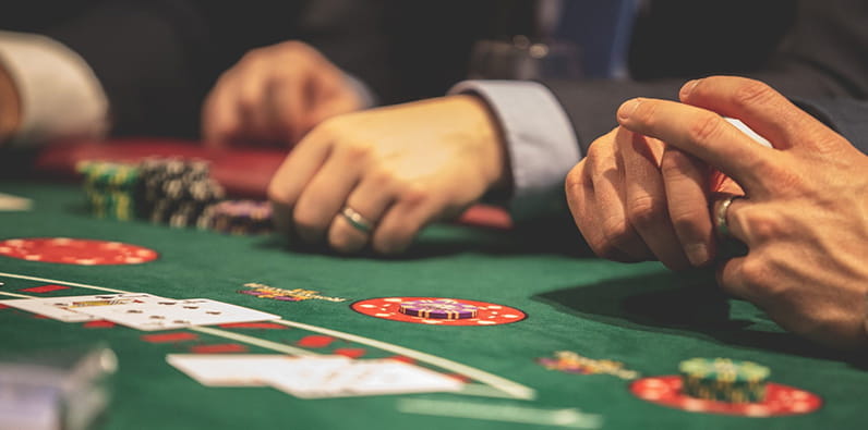 Men Sitting at a Blackjack Table