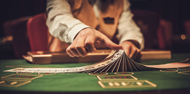 Dealer Shuffling a Deck of Playing Cards