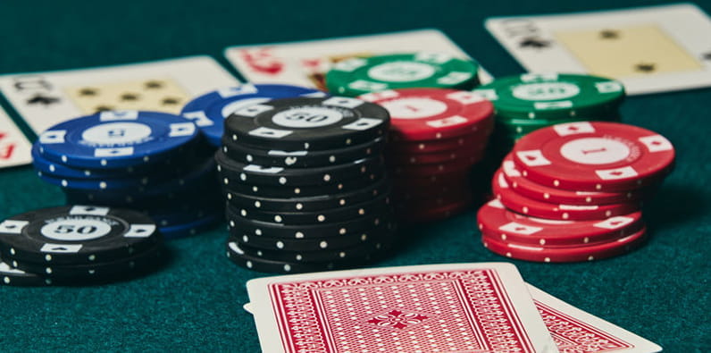 Casino Chips and A Deck of Playing Cards