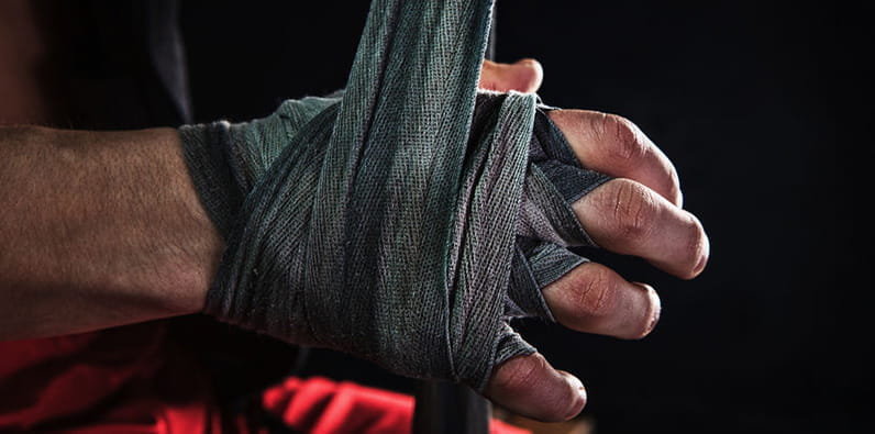 Boxer Taping His Right Hand