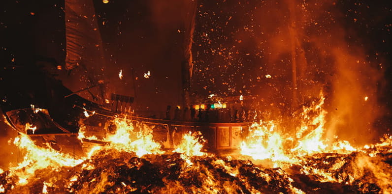 Burning Boat in the Sea