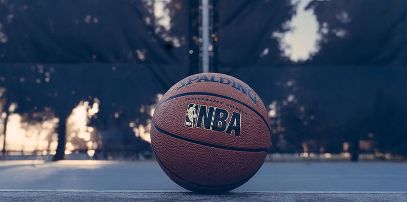 Spalding Professional Basketball Ball On a Basketball Field 