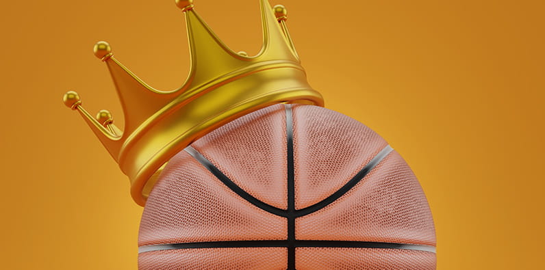Golden crown on a basketball ball on a white background