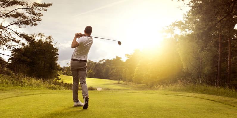 Man Swings on the Golf Course