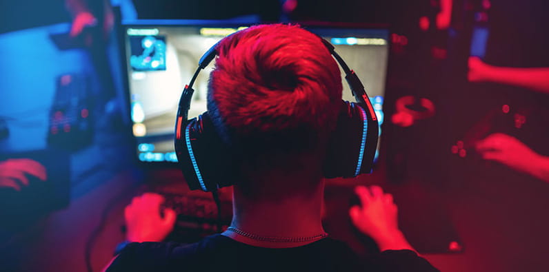 Boy Playing Video Games on the Computer