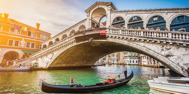 The Rialto Bridge and Gondolas in Venice Italy