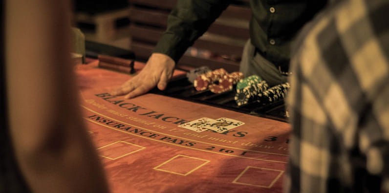 Croupier Dealing Blackjack Cards