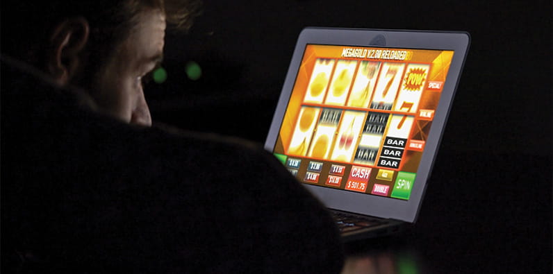 A Man Playing Online Slot Games