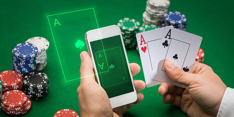 Man Playing Blackjack ad Holding His Phone