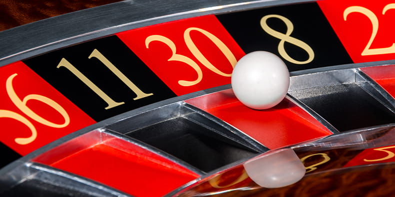 Roulette Wheel with a Ball on Number Thirty