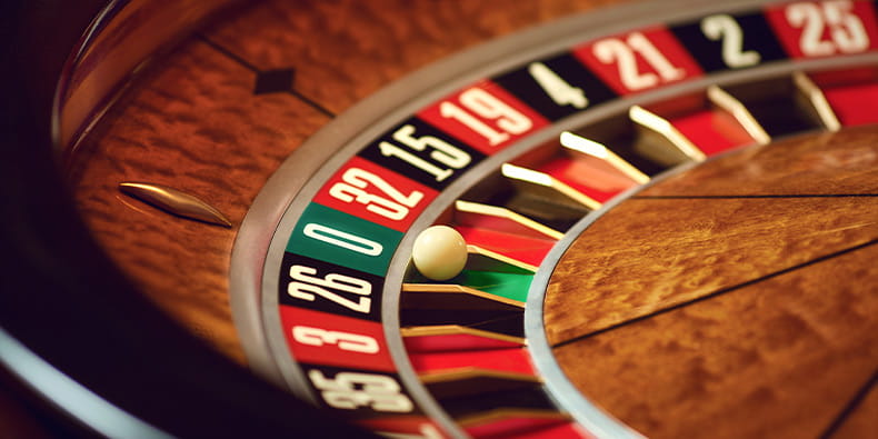 Roulette Wheel with Ball on Zero