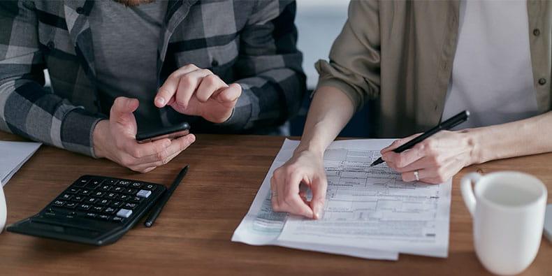 Two People Doing Paperwork