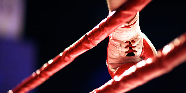 Fighter Arm on Boxing Ring Rope