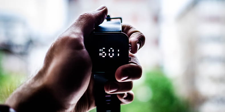 A Man Holding a Stopwatch