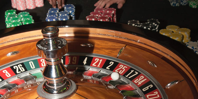 A Roulette Wheel and Casino Chips 