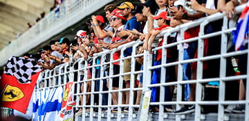 F1 Fans Watching From the Grand Stand