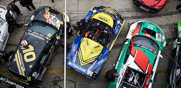 Cars Lined Up in the Pit Lane