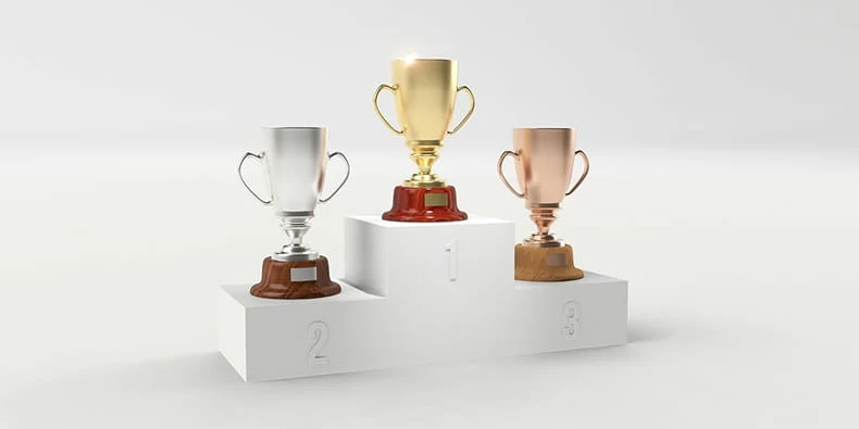 Three Trophies and Podium