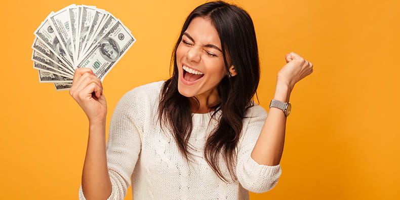 Cheerful Woman Holding Money