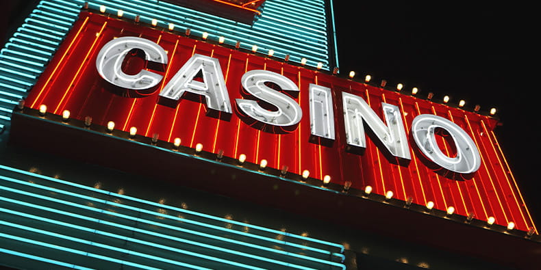  Large Red Neon Sign Reading "Casino"