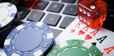 Laptop, Playing Cards, Dice, Magnifying Glass